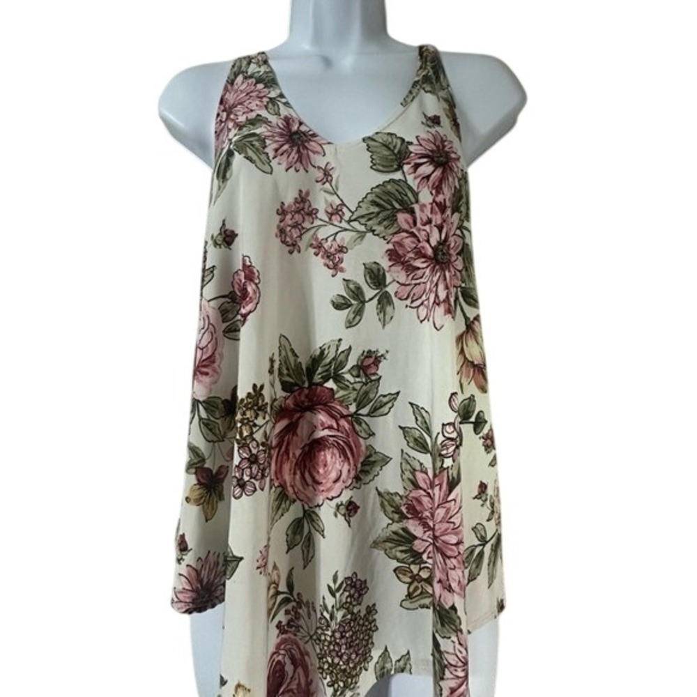 Beautiful floral  sleeveless shirt  size Med  First Love